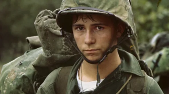 A photo of a young soldier in Army fatigues
