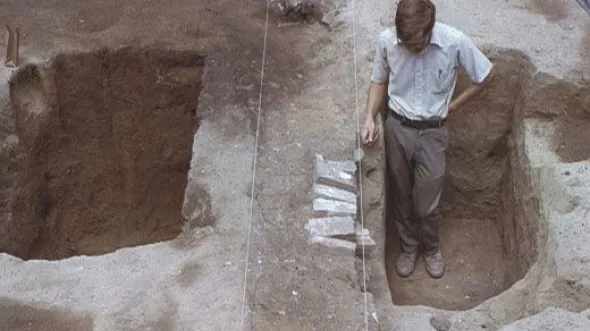 Archaeologist working at the root cellar complex at the Kingsmill Quarter (44JC0039) in James City County