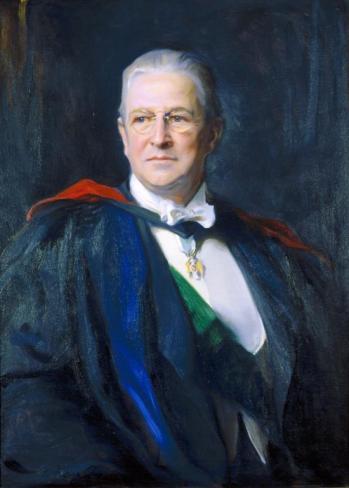 Portrait of Alexander Weddell dressed in professional attire, looking off towards the left.  