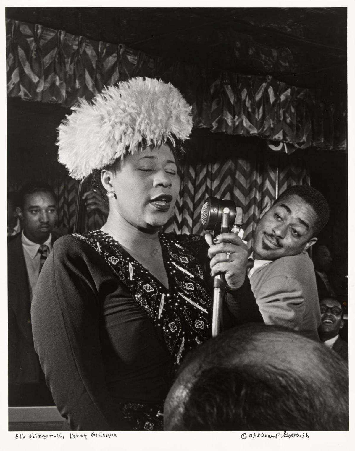 Ella Fitzgerald sings in Washington, about 1947, as Dilly Gillespie and bassist Ray Brown watch.