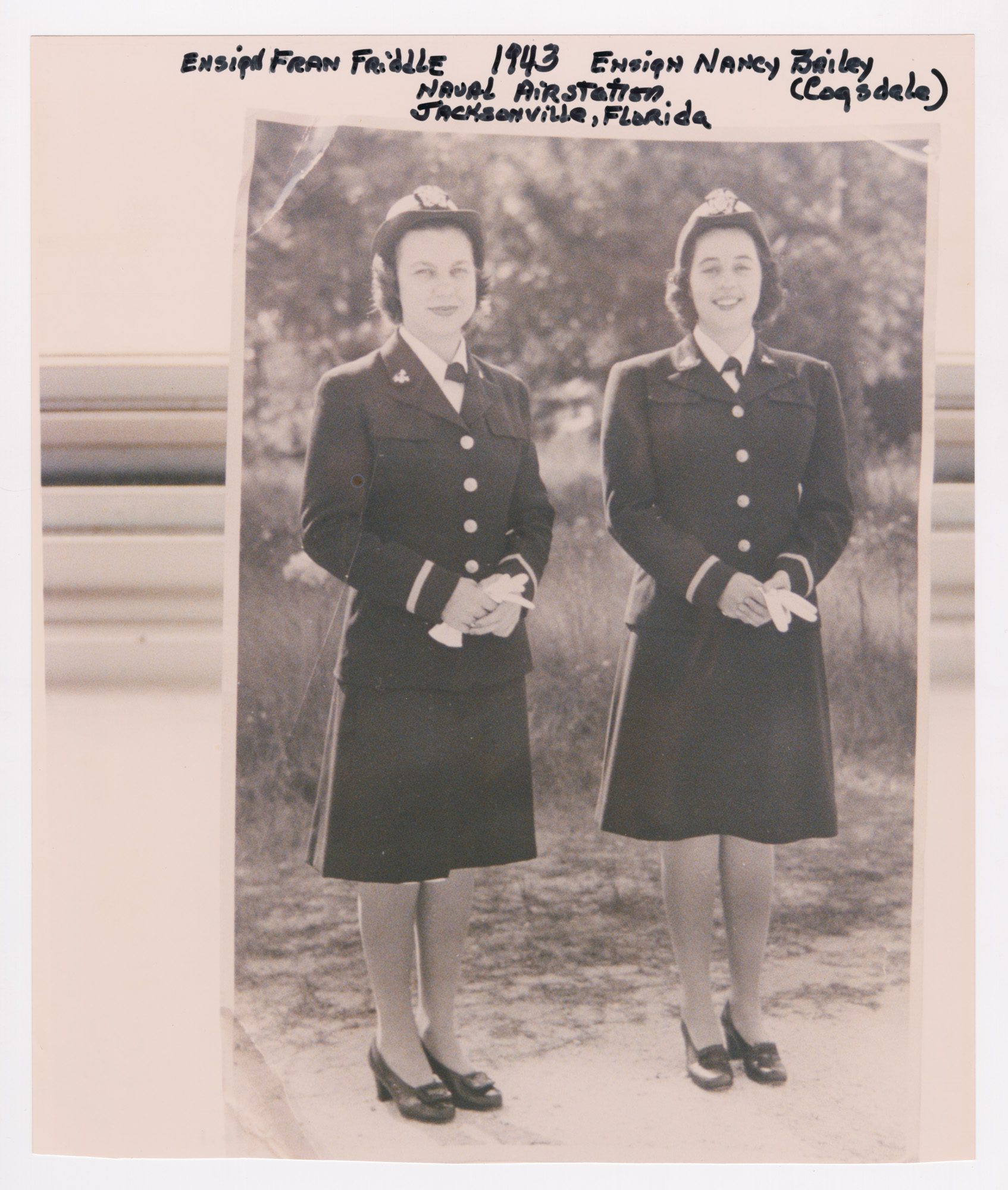 Ensigns Fran Friddle and Nancy Bailey Bon Cogsdale in winter WAVE uniforms at Naval Air Station, Jacksonville, Florida in 1943. (VMHC 1996.86.1. Gift of Nancy Bailey Bon Cogsdale) 