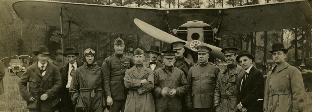 Photograph of Lt. Sylvanus Ingram and an early biplane, about 1918–1920 (VHS 2006.177.1_v1) Photograph of Lt. Sylvanus Ingram and an early biplane, about 1918–1920 (VHS 2006.177.1_v1)