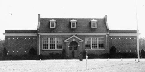 Black and White Image of the Front of the George W. Watkins School    