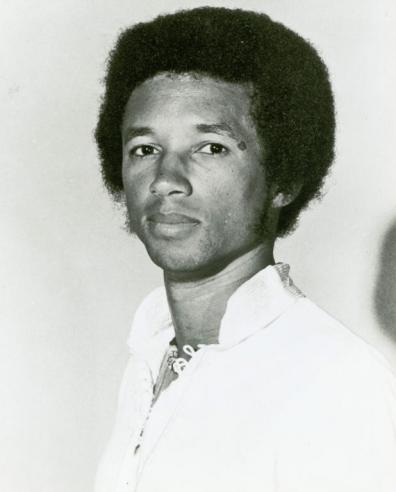 Black and White Portrait Photograph of Arthur Ashe, Jr. (1943-1993) Looking Into The Camera.  