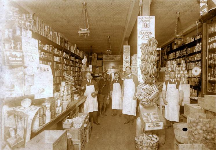 Weldon's Market, Richmond, early 20th century (VHS accession number: 2001.230.799). The photograph is an interior view of Weldon's Market located on Robinson Street between Kensington and Stuart Avenue, with five men standing. Weldon's Market, Richmond, early 20th century