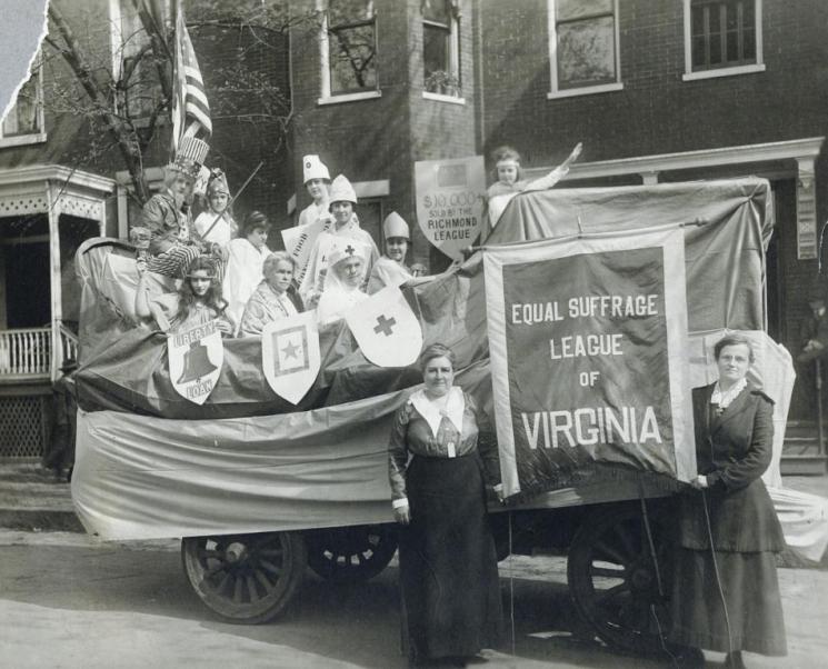 Equal Suffrage League of Virginia, Richmond, c. 1919 (VHS accession number: 2002.226.1). Photographic print, mounted on board. Equal Suffrage League of Richmond float in 1918 Liberty Bond Parade, Richmond Virginia. Sepia-toned print shows costumed group of eleven people posing in a car that has been draped and decorated to make a parade float. Ralph Harvie Wormeley (1904-1958), the only individual identified in the photograph, is dressed like Uncle Sam. A few women are dressed to represent liberty, the goddess Athena, the French Marianne figure and a Red Cross nurses. One sign reads "Libert Loan." Two women stand in front of the float and hold a large banner reading "Equal Suffrage League of Virginia" between them. Photograph is mounted to board bearing the "Foster / RICHMOND" imprint. 26.67 cm x 35.56 cm. Equal Suffrage League of Virginia, Richmond, c. 1919