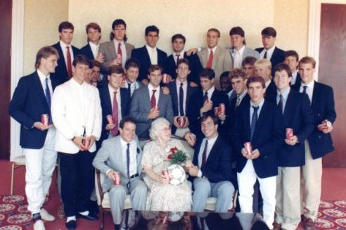 Betty Sams Christian surrounded by the 1988 University of Virginia Soccer Team