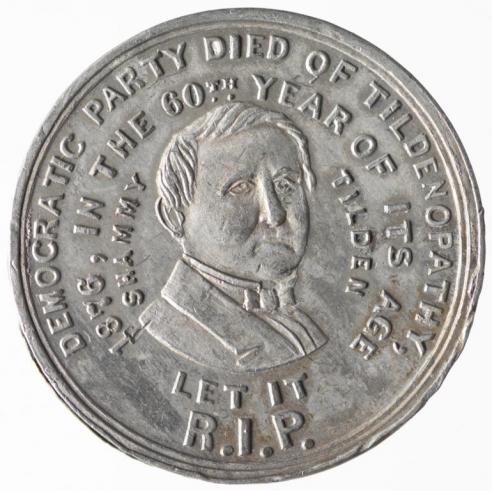 A silver satirical campaign medal with a bust of Samuel Tilden surrounded by the inscription: "Democratic Party Died of Tildenopathy./1876, In The 60th Year of Its Age/Shammy Tilden. Let It R.I.P."