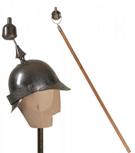 A nickel-plated torch helmet and handheld torch used for nighttime parades for the Grover Cleveland campaign
