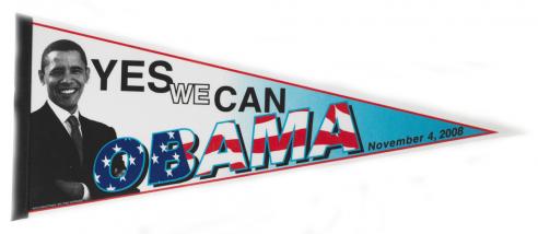  Flag with a black and white image of Barack Obama with the text, “YES WE CAN” and “OBAMA” in American flag colors.     